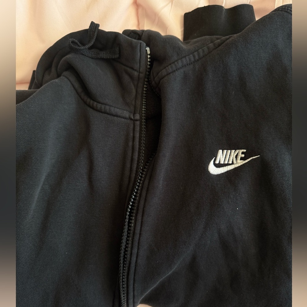 good quality, brand new , just has a visible bleach stain .